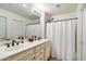 Bathroom boasts double sinks and a shower/tub combo at 2757 S Pewter Dr # 103, Gilbert, AZ 85295