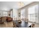 Dining area with view into living room and kitchen at 2757 S Pewter Dr # 103, Gilbert, AZ 85295