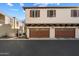 Exterior view of two-story townhome with two-car garage at 2757 S Pewter Dr # 103, Gilbert, AZ 85295