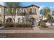 Two-story townhome with stone exterior and private entrance at 2757 S Pewter Dr # 103, Gilbert, AZ 85295