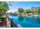 Tranquil lake view with a gazebo and surrounding homes at 2757 S Pewter Dr # 103, Gilbert, AZ 85295