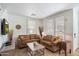 Bright living room featuring neutral-toned furniture and large windows at 2757 S Pewter Dr # 103, Gilbert, AZ 85295