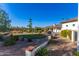 Landscaped backyard with a putting green at 28602 N 58Th St, Cave Creek, AZ 85331