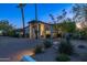 Elegant home exterior at night at 28602 N 58Th St, Cave Creek, AZ 85331