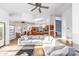 Open living space with light colored sectional sofa and tile floors at 28602 N 58Th St, Cave Creek, AZ 85331