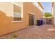 Small backyard with gravel and sliding glass door access at 2875 S Key Biscayne Dr, Gilbert, AZ 85295