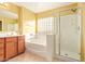 Bathroom boasts a soaking tub, double vanity, and shower at 2875 S Key Biscayne Dr, Gilbert, AZ 85295