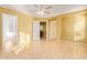 Well-lit bedroom with ample closet space and wood-look floors at 2875 S Key Biscayne Dr, Gilbert, AZ 85295