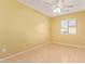 Spacious bedroom with light walls and wood-look floors at 2875 S Key Biscayne Dr, Gilbert, AZ 85295