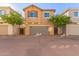 Front view of two story home with garage at 2875 S Key Biscayne Dr, Gilbert, AZ 85295