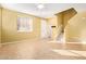 Living room with tile floors and a staircase at 2875 S Key Biscayne Dr, Gilbert, AZ 85295