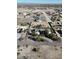 Aerial view showing a large house, expansive lot, and surrounding desert landscape at 28821 N Ashbrook Ln, Queen Creek, AZ 85144