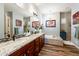 Elegant bathroom with granite countertops and soaking tub at 28821 N Ashbrook Ln, Queen Creek, AZ 85144