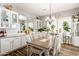 Elegant dining room featuring a rustic table and chairs at 28821 N Ashbrook Ln, Queen Creek, AZ 85144