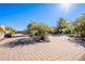 Circular paved driveway and landscaping in the front yard at 28821 N Ashbrook Ln, Queen Creek, AZ 85144