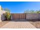 Wooden gate leading into the backyard at 28821 N Ashbrook Ln, Queen Creek, AZ 85144