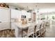 Island kitchen with granite countertops and white cabinets at 28821 N Ashbrook Ln, Queen Creek, AZ 85144