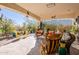 Relaxing patio with seating and colorful decor at 28821 N Ashbrook Ln, Queen Creek, AZ 85144