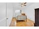 Cozy bedroom with hardwood floors and a brass bed frame at 303 W 9Th St, Mesa, AZ 85201