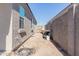 Small backyard with gravel and a side yard at 30905 W Fairmount Ave, Buckeye, AZ 85396