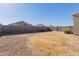 Large backyard with gravel and block wall at 30905 W Fairmount Ave, Buckeye, AZ 85396