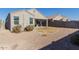 House backyard view with patio at 30905 W Fairmount Ave, Buckeye, AZ 85396