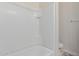 Clean bathroom with a tub and shower combination at 30905 W Fairmount Ave, Buckeye, AZ 85396