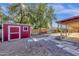 Pathway leads to backyard with shed and patio at 3101 W Topeka Dr, Phoenix, AZ 85027