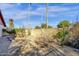 Landscaped backyard with desert plants and stone pathway at 3101 W Topeka Dr, Phoenix, AZ 85027