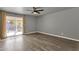 Bright bedroom with sliding glass door to backyard at 3101 W Topeka Dr, Phoenix, AZ 85027