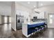 Modern kitchen with blue island and quartz countertops at 3101 W Topeka Dr, Phoenix, AZ 85027