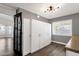 Laundry room with white cabinets and built in storage at 3101 W Topeka Dr, Phoenix, AZ 85027