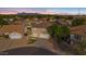 Aerial view of two-story house and neighborhood at 3141 S 83Rd Cir, Mesa, AZ 85212