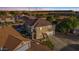 Aerial view of house with pool and surrounding homes at 3141 S 83Rd Cir, Mesa, AZ 85212