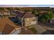 Aerial view of two story house with pool and surrounding homes at 3141 S 83Rd Cir, Mesa, AZ 85212