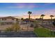 Deck overlooking a backyard oasis with fire pit at 3141 S 83Rd Cir, Mesa, AZ 85212