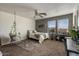 Charming bedroom with a hanging chair and built-in shelving at 3141 S 83Rd Cir, Mesa, AZ 85212