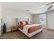 Cozy bedroom with plush carpet and modern nightstand at 3141 S 83Rd Cir, Mesa, AZ 85212