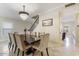 Formal dining room with a chandelier and seating for eight at 3141 S 83Rd Cir, Mesa, AZ 85212