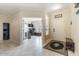 Entryway with view into home office and sitting area at 3141 S 83Rd Cir, Mesa, AZ 85212