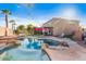 Inviting backyard oasis featuring a large pool and patio area at 3141 S 83Rd Cir, Mesa, AZ 85212