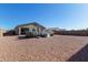 Large backyard with gravel and above ground pool at 3189 N Excursion Ln, Casa Grande, AZ 85122