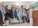 Walk-in closet with ample shelving and hanging space at 3189 N Excursion Ln, Casa Grande, AZ 85122