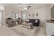 Living room with comfy seating and neutral decor at 3189 N Excursion Ln, Casa Grande, AZ 85122