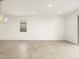 Bright, airy living room featuring tile flooring and ample natural light at 3201 E Hayden Rose Ave, San Tan Valley, AZ 85143