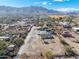 Aerial view of property with road and distant mountains at 3204 W Mcneil St, Laveen, AZ 85339