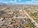 Aerial view of property with distant city and mountains at 3204 W Mcneil St, Laveen, AZ 85339