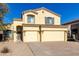 Two-story house with a three-car garage and desert landscaping at 3482 W Mineral Butte Dr, San Tan Valley, AZ 85144