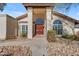 Front entry of a home with double doors and stone pathway at 408 W Straford Dr, Chandler, AZ 85225