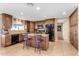 Modern kitchen with granite countertops and stainless steel appliances at 408 W Straford Dr, Chandler, AZ 85225